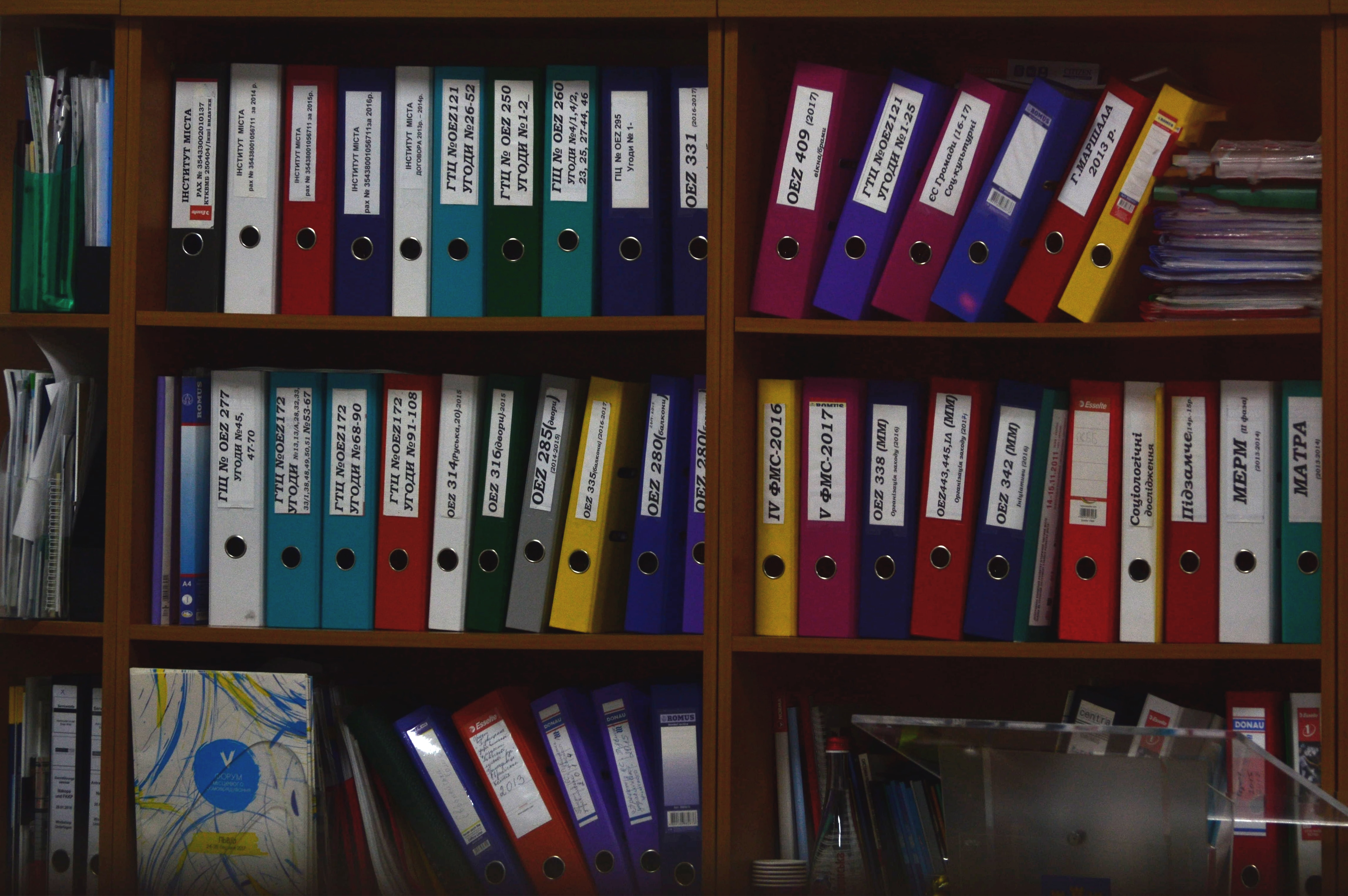 folders arranged on shelves