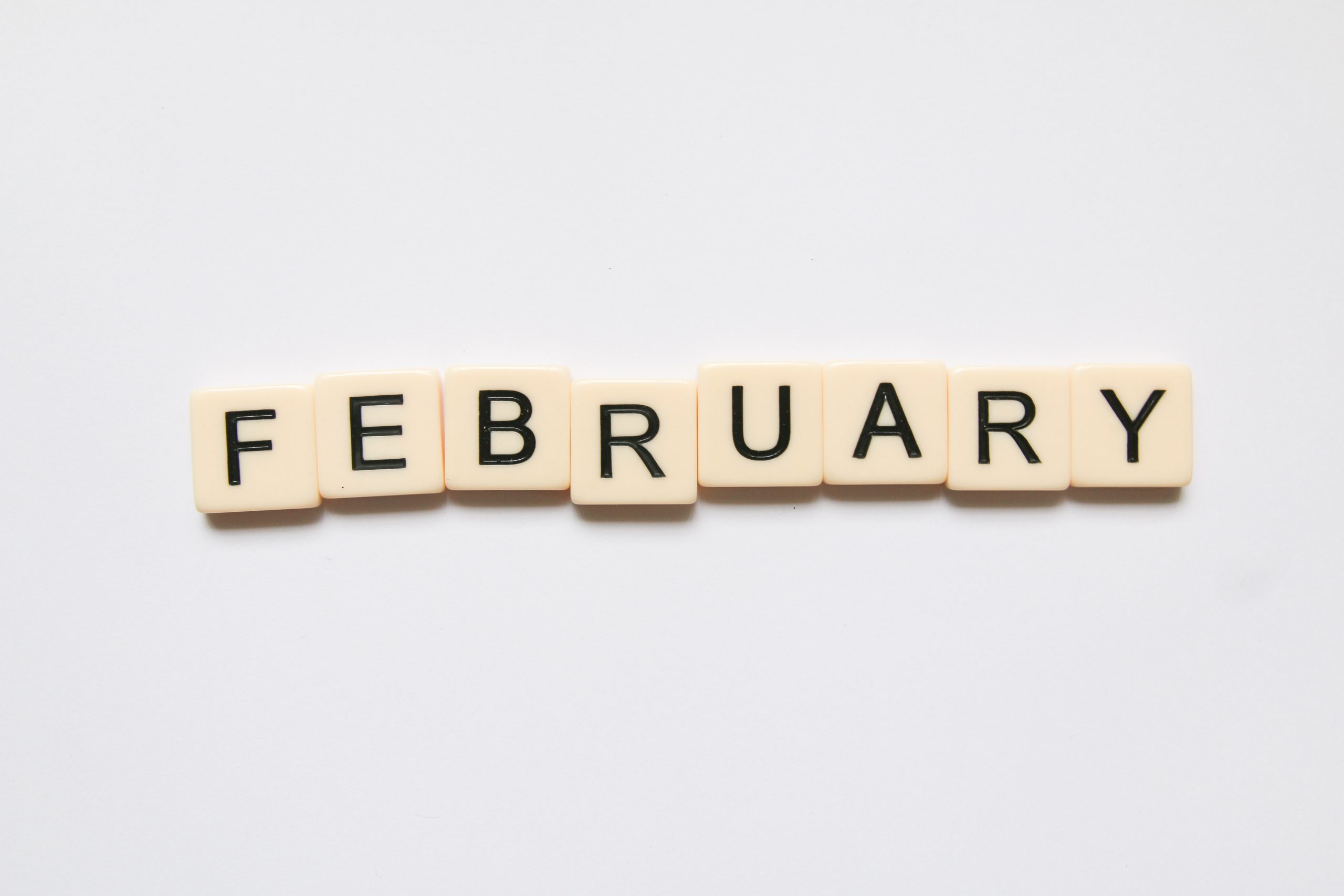 February written using wooden blocks
