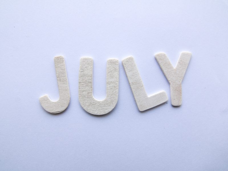 the word 'July' written using paper cuts