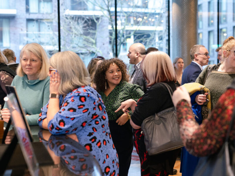 informal gathering of people, they are all chatting to each other