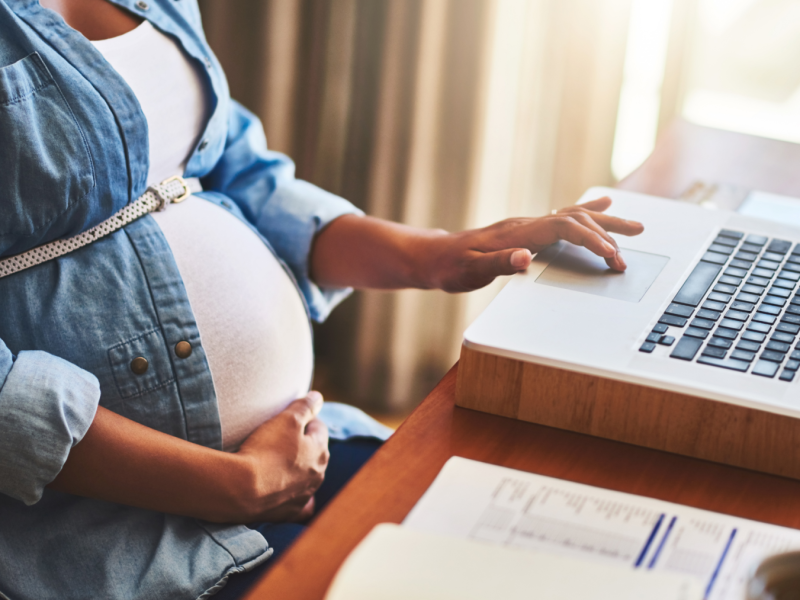 pregnant woman working on laptop